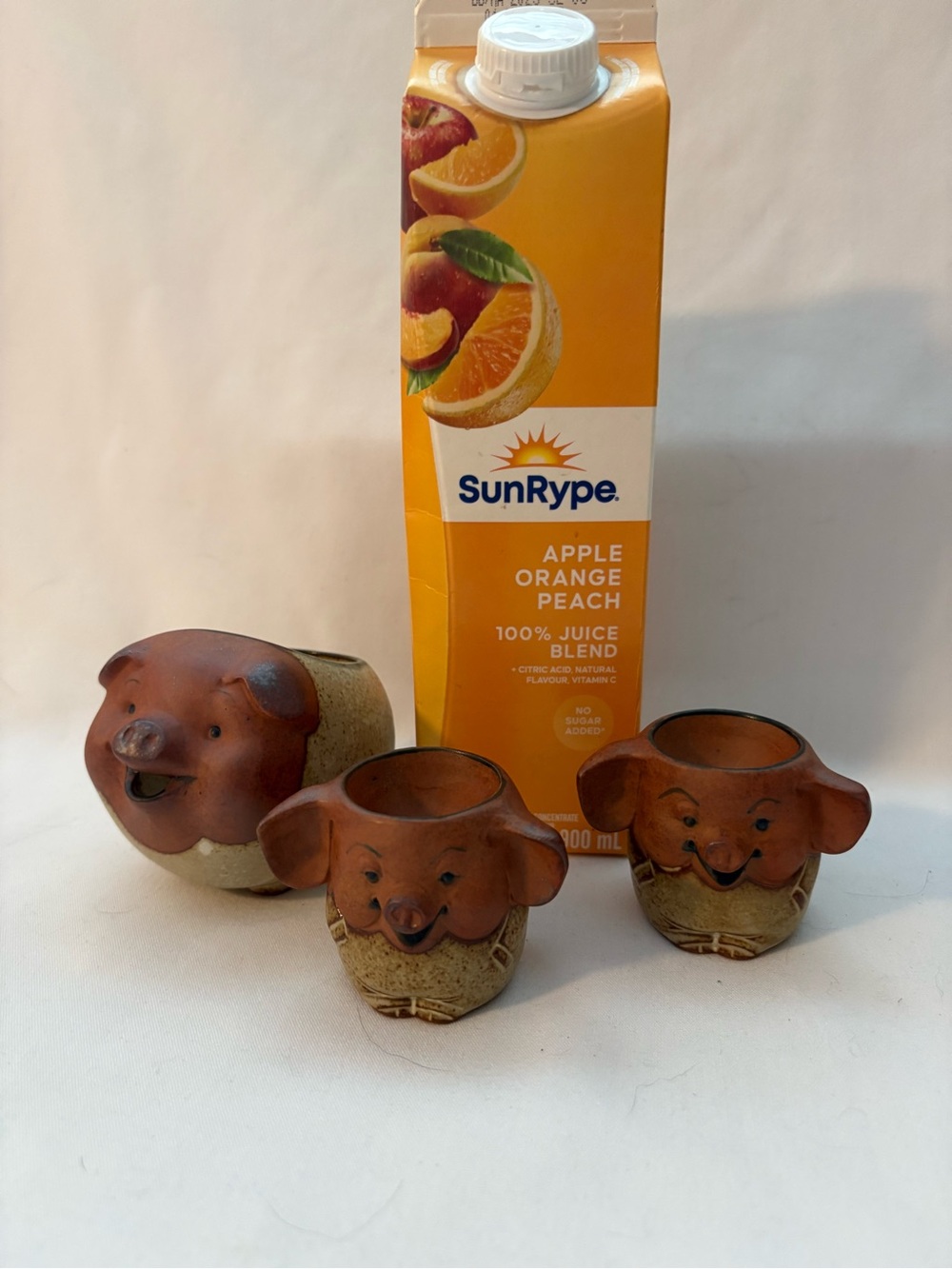 Happy Pig creamer and two egg cups